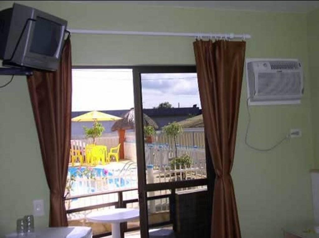 Hotel Pousada Mineirinho Balneario Praia do Leste Room photo